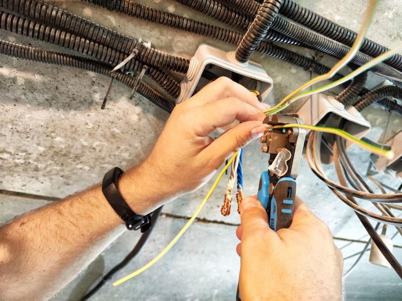 Electrician Wiring a Commercial Space